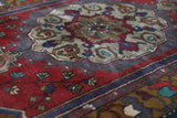 Vintage Turkish rug in a living room setting, pile rug, Turkish rug, vintage rug, portland, rug shop, bright colors, wild shaman, soft rug, bold color, Portland, Oregon, rug store, rug shop, local shop, antique rug