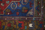 Vintage Turkish rug in a living room setting, pile rug, Turkish rug, vintage rug, portland, rug shop, bright colors, wild shaman, soft rug, bold color, Portland, Oregon, rug store, rug shop, local shop, antique rug