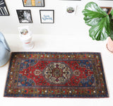 Vintage Turkish rug in living room setting, old rug, antique rug, pastel colors, faded colors, Turkish rug, vintage rug, soft rug, Portland, Oregon, rug store, rug shop, local shop