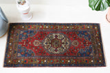 Vintage Turkish rug in living room setting, old rug, antique rug, pastel colors, faded colors, Turkish rug, vintage rug, soft rug, Portland, Oregon, rug store, rug shop, local shop