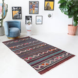 Vintage kilim rug in living room setting, bright colors, wild shaman, soft rug, bold color, Portland, Oregon, rug store, rug shop, local shop, vintage rug, modern kilim, warm colors