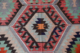 Vintage kilim rug in room decor setting, old rug, antique rug, pastel colors, faded colors, Turkish rug, vintage rug, soft rug, Portland, Oregon, rug store, rug shop, local shop, bold colors, bright colors, faded colors