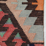 Vintage kilim rug in room decor setting, old rug, antique rug, pastel colors, faded colors, Turkish rug, vintage rug, soft rug, Portland, Oregon, rug store, rug shop, local shop, bold colors, bright colors, faded colors