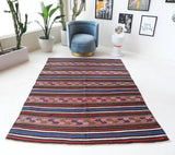 Vintage kilim rug in living room setting, bright colors, wild shaman, soft rug, bold color, Portland, Oregon, rug store, rug shop, local shop, vintage rug, modern kilim, warm colors