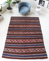 Vintage kilim rug in living room setting, bright colors, wild shaman, soft rug, bold color, Portland, Oregon, rug store, rug shop, local shop, vintage rug, modern kilim, warm colors