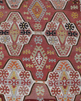 Vintage kilim rug in living room setting, old rug, antique rug, pastel colors, faded colors, Turkish rug, vintage rug, soft rug, Portland, Oregon, rug store, rug shop, local shop, earthy tones, earthy colors, warm colors