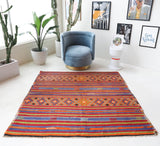 Vintage kilim rug in living room setting, bright colors, wild shaman, soft rug, bold color, Portland, Oregon, rug store, rug shop, local shop, vintage rug, modern kilim, warm colors