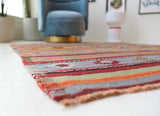 Vintage kilim rug in room decor setting, old rug, antique rug, pastel colors, faded colors, Turkish rug, vintage rug, soft rug, Portland, Oregon, rug store, rug shop, local shop, bold colors, bright colors, faded colors