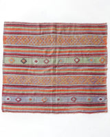 Vintage kilim rug in room decor setting, old rug, antique rug, pastel colors, faded colors, Turkish rug, vintage rug, soft rug, Portland, Oregon, rug store, rug shop, local shop, bold colors, bright colors, faded colors