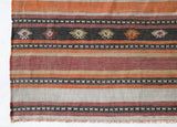 Vintage kilim rug in living room setting, old rug, antique rug, pastel colors, faded colors, Turkish rug, vintage rug, soft rug, Portland, Oregon, rug store, rug shop, local shop, earthy tones, earthy colors, warm colors