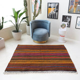 Vintage kilim rug in living room setting, bright colors, wild shaman, soft rug, bold color, Portland, Oregon, rug store, rug shop, local shop, vintage rug, modern kilim, warm colors