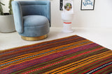 Vintage kilim rug in living room setting, bright colors, wild shaman, soft rug, bold color, Portland, Oregon, rug store, rug shop, local shop, vintage rug, modern kilim, warm colors