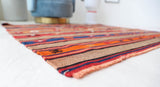 Vintage kilim rug in living room setting, bright colors, wild shaman, soft rug, bold color, Portland, Oregon, rug store, rug shop, local shop, vintage rug, modern kilim, warm colors