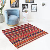 Vintage kilim rug in living room setting, bright colors, wild shaman, soft rug, bold color, Portland, Oregon, rug store, rug shop, local shop, vintage rug, modern kilim, warm colors