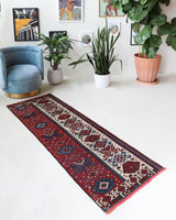 Vintage Turkish runner rug in a living room setting, pile rug, Turkish rug, vintage rug, portland, rug shop, bright colors, wild shaman, soft rug, bold color, Portland, Oregon, rug store, rug shop, local shop, antique rug