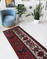 Vintage Turkish runner rug in a living room setting, pile rug, Turkish rug, vintage rug, portland, rug shop, bright colors, wild shaman, soft rug, bold color, Portland, Oregon, rug store, rug shop, local shop, antique rug