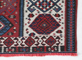 Vintage Turkish runner rug in a living room setting, pile rug, Turkish rug, vintage rug, portland, rug shop, bright colors, wild shaman, soft rug, bold color, Portland, Oregon, rug store, rug shop, local shop, antique rug