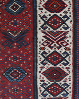 Vintage Turkish runner rug in a living room setting, pile rug, Turkish rug, vintage rug, portland, rug shop, bright colors, wild shaman, soft rug, bold color, Portland, Oregon, rug store, rug shop, local shop, antique rug