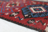 Vintage Turkish runner rug in a living room setting, pile rug, Turkish rug, vintage rug, portland, rug shop, bright colors, wild shaman, soft rug, bold color, Portland, Oregon, rug store, rug shop, local shop, antique rug