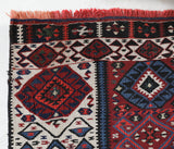 Vintage Turkish runner rug in a living room setting, pile rug, Turkish rug, vintage rug, portland, rug shop, bright colors, wild shaman, soft rug, bold color, Portland, Oregon, rug store, rug shop, local shop, antique rug