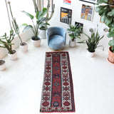 Vintage Turkish runner rug in a living room setting, pile rug, Turkish rug, vintage rug, portland, rug shop, bright colors, wild shaman, soft rug, bold color, Portland, Oregon, rug store, rug shop, local shop, antique rug