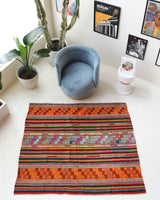 Vintage kilim rug in living room setting, bright colors, wild shaman, soft rug, bold color, Portland, Oregon, rug store, rug shop, local shop, vintage rug, modern kilim, warm colors