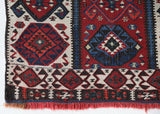Vintage Turkish runner rug in a living room setting, pile rug, Turkish rug, vintage rug, portland, rug shop, bright colors, wild shaman, soft rug, bold color, Portland, Oregon, rug store, rug shop, local shop, antique rug
