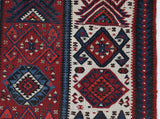 Vintage Turkish runner rug in a living room setting, pile rug, Turkish rug, vintage rug, portland, rug shop, bright colors, wild shaman, soft rug, bold color, Portland, Oregon, rug store, rug shop, local shop, antique rug