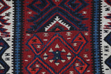 Vintage Turkish runner rug in a living room setting, pile rug, Turkish rug, vintage rug, portland, rug shop, bright colors, wild shaman, soft rug, bold color, Portland, Oregon, rug store, rug shop, local shop, antique rug