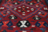 Vintage Turkish runner rug in a living room setting, pile rug, Turkish rug, vintage rug, portland, rug shop, bright colors, wild shaman, soft rug, bold color, Portland, Oregon, rug store, rug shop, local shop, antique rug