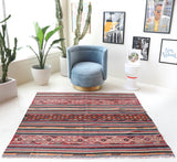 Vintage kilim rug in living room setting, bright colors, wild shaman, soft rug, bold color, Portland, Oregon, rug store, rug shop, local shop, vintage rug, modern kilim, warm colors