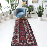 Vintage Turkish runner rug in a living room setting, pile rug, Turkish rug, vintage rug, portland, rug shop, bright colors, wild shaman, soft rug, bold color, Portland, Oregon, rug store, rug shop, local shop, antique rug