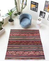 Vintage kilim rug in living room setting, bright colors, wild shaman, soft rug, bold color, Portland, Oregon, rug store, rug shop, local shop, vintage rug, modern kilim, warm colors