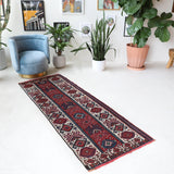 Vintage Turkish runner rug in a living room setting, pile rug, Turkish rug, vintage rug, portland, rug shop, bright colors, wild shaman, soft rug, bold color, Portland, Oregon, rug store, rug shop, local shop, antique rug