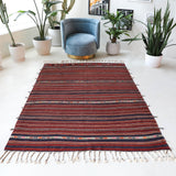 Vintage kilim rug in room decor setting, old rug, antique rug, pastel colors, faded colors, Turkish rug, vintage rug, soft rug, Portland, Oregon, rug store, rug shop, local shop, bold colors, bright colors, faded colors