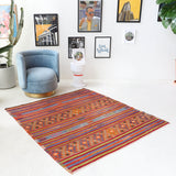 Vintage kilim rug in living room setting, bright colors, wild shaman, soft rug, bold color, Portland, Oregon, rug store, rug shop, local shop, vintage rug, modern kilim, warm colors