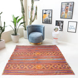 Vintage kilim rug in living room setting, bright colors, wild shaman, soft rug, bold color, Portland, Oregon, rug store, rug shop, local shop, vintage rug, modern kilim, warm colors