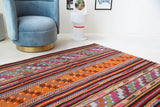 Vintage kilim rug in living room setting, bright colors, wild shaman, soft rug, bold color, Portland, Oregon, rug store, rug shop, local shop, vintage rug, modern kilim, warm colors