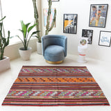 Vintage kilim rug in living room setting, bright colors, wild shaman, soft rug, bold color, Portland, Oregon, rug store, rug shop, local shop, vintage rug, modern kilim, warm colors