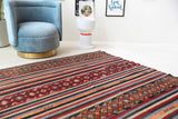 Vintage kilim rug in living room setting, bright colors, wild shaman, soft rug, bold color, Portland, Oregon, rug store, rug shop, local shop, vintage rug, modern kilim, warm colors