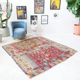 Vintage kilim rug in room decor setting, old rug, antique rug, pastel colors, faded colors, Turkish rug, vintage rug, soft rug, Portland, Oregon, rug store, rug shop, local shop, bold colors, bright colors, faded colors