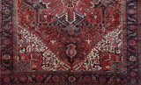 Antique Persian area rug in a living room setting, pile rug, vintage rug, portland, rug shop, bright colors, wild shaman, soft rug, bold color, Portland, Oregon, rug store, rug shop, local shop, antique rug, Persian rug, handmade rug, wool rug, distressed rug