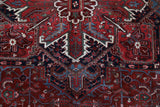 Antique Persian area rug in a living room setting, pile rug, vintage rug, portland, rug shop, bright colors, wild shaman, soft rug, bold color, Portland, Oregon, rug store, rug shop, local shop, antique rug, Persian rug, handmade rug, wool rug, distressed rug