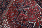 Antique Persian area rug in a living room setting, pile rug, vintage rug, portland, rug shop, bright colors, wild shaman, soft rug, bold color, Portland, Oregon, rug store, rug shop, local shop, antique rug, Persian rug, handmade rug, wool rug, distressed rug
