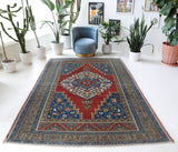 Vintage Turkish rug in a living room setting, Area rug in a living room setting, pile rug, Turkish rug, custom rug, modern rug, portland, rug shop, bright colors, wild shaman, soft rug, bold color, Portland, Oregon, rug store, rug shop, local shop