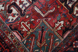 Antique Persian area rug in a living room setting, pile rug, vintage rug, portland, rug shop, bright colors, wild shaman, soft rug, bold color, Portland, Oregon, rug store, rug shop, local shop, antique rug, Persian rug, handmade rug, wool rug, distressed rug