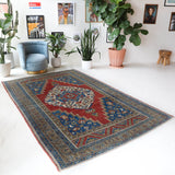 Vintage Turkish rug in a living room setting, Area rug in a living room setting, pile rug, Turkish rug, custom rug, modern rug, portland, rug shop, bright colors, wild shaman, soft rug, bold color, Portland, Oregon, rug store, rug shop, local shop