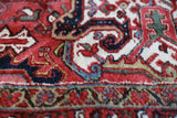 Antique Persian area rug in a living room setting, pile rug, vintage rug, portland, rug shop, bright colors, wild shaman, soft rug, bold color, Portland, Oregon, rug store, rug shop, local shop, antique rug, Persian rug, handmade rug, wool rug, distressed rug