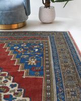 Vintage Turkish rug in a living room setting, Area rug in a living room setting, pile rug, Turkish rug, custom rug, modern rug, portland, rug shop, bright colors, wild shaman, soft rug, bold color, Portland, Oregon, rug store, rug shop, local shop