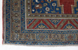 Vintage Turkish rug in a living room setting, Area rug in a living room setting, pile rug, Turkish rug, custom rug, modern rug, portland, rug shop, bright colors, wild shaman, soft rug, bold color, Portland, Oregon, rug store, rug shop, local shop